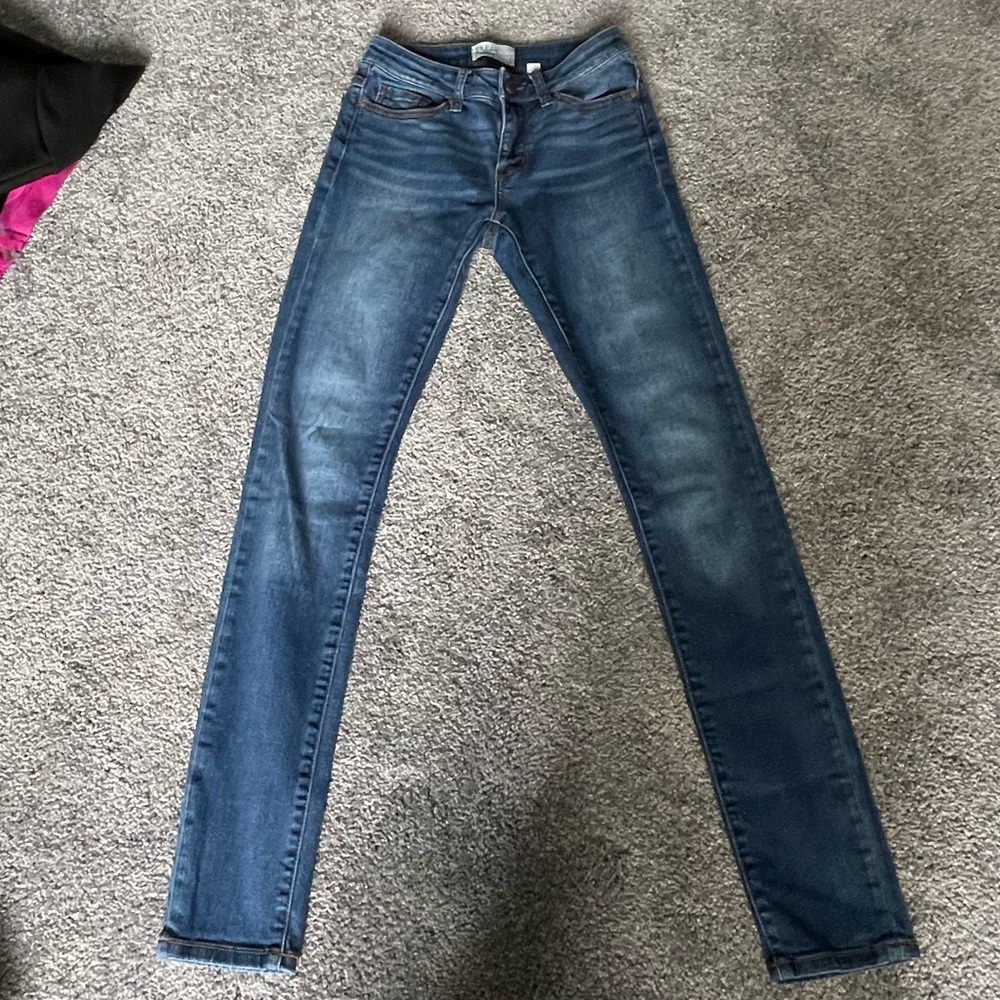 Buckle mid-rise skinny jeans 25Rx31 1/2